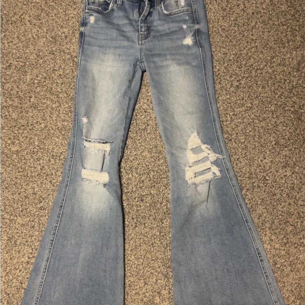 The Buckle Distressed Light Blue Flare Jeans
